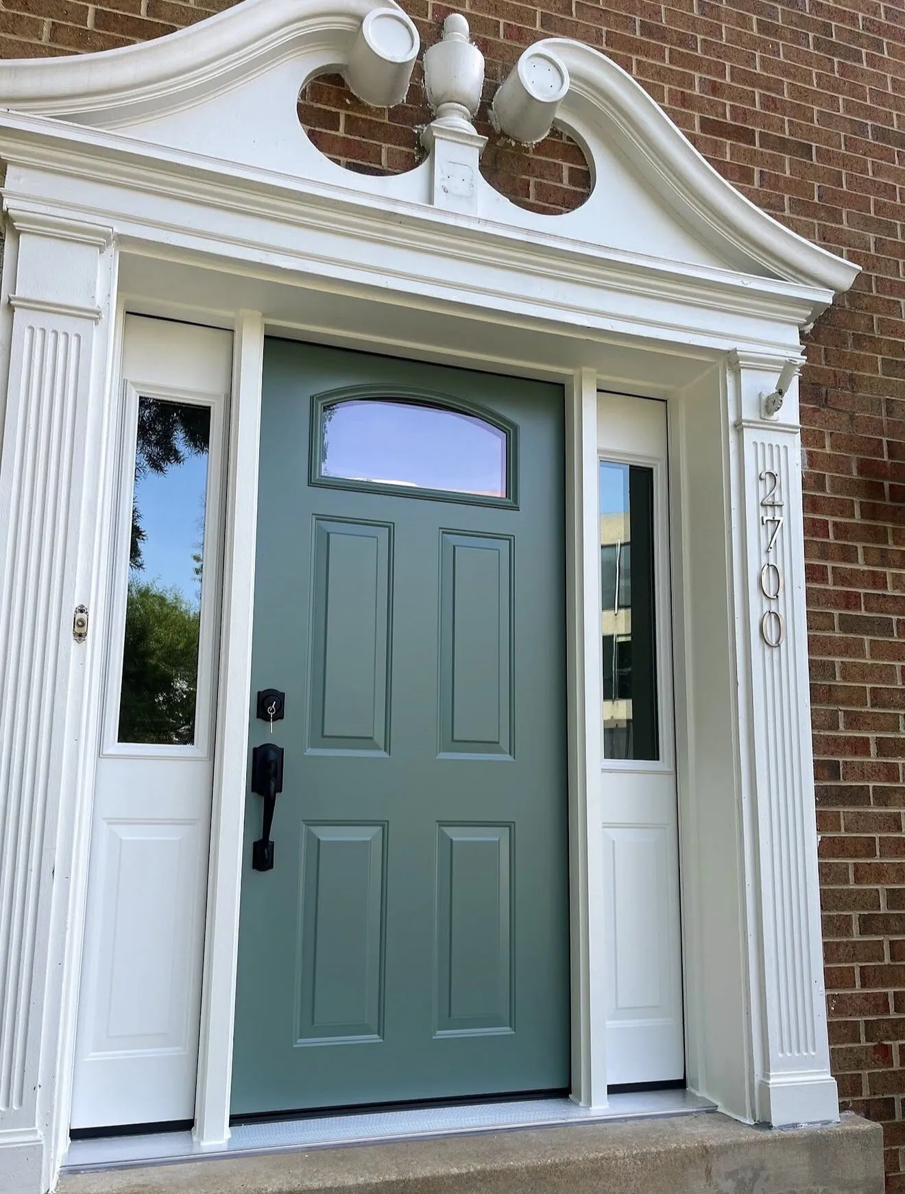 Detailed trim around a completed replacement door