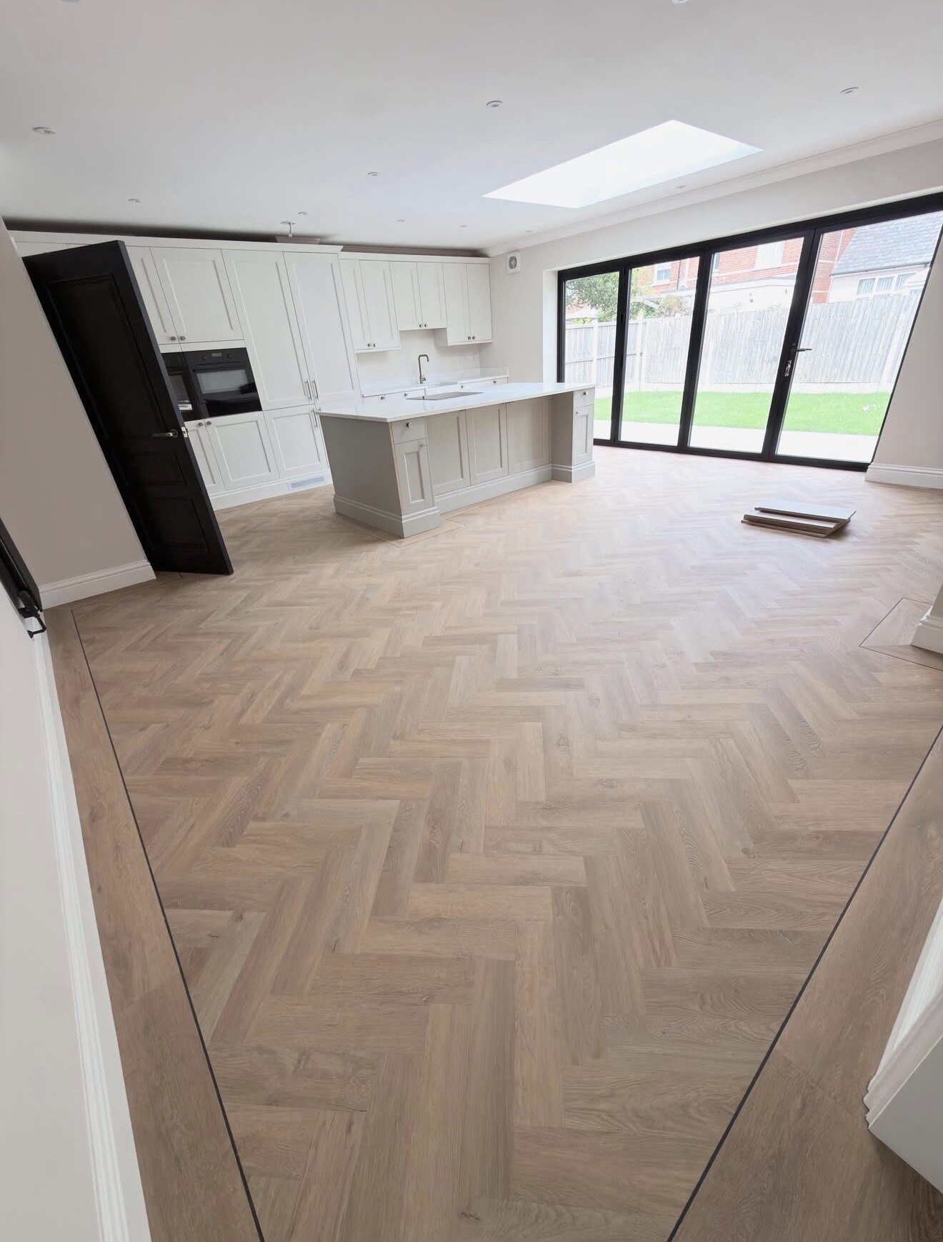 Completed flooring installation by Rufino Carpentry